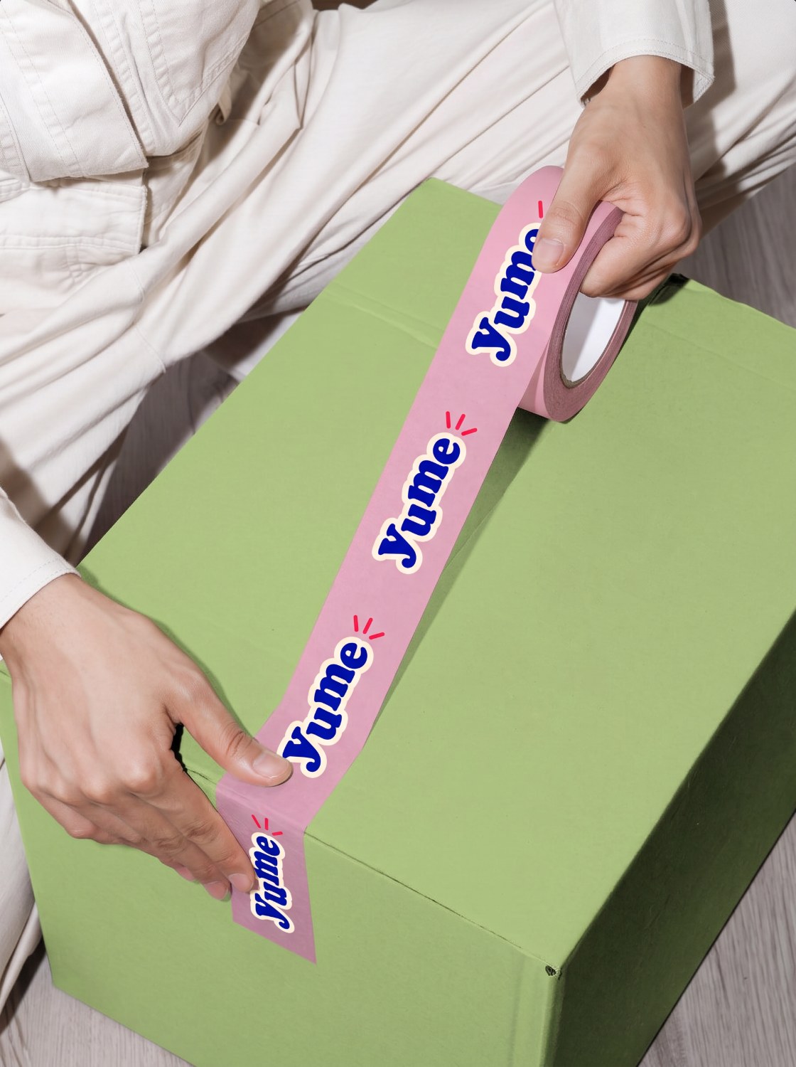 Yume branded packing tape on box
